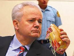 Defiant Milosevic Eats Big,
