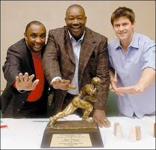 Former Heisman Trophy winners Johnny 