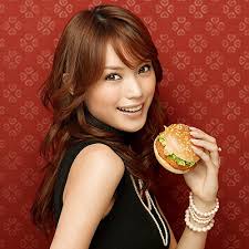 Japanese model Yuri Ebihara holds a