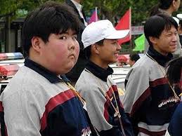 with a photo of his chubby face