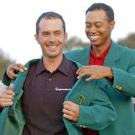 Image Tiger Woods helps <b>Mike Weir</b> Picture