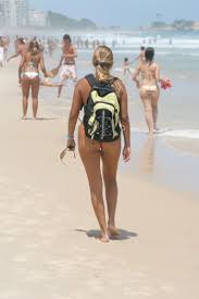Image of Girl walking Ipanema beach