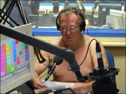 reads the sports news naked