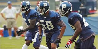 Linebacker Antonio Pierce (58),