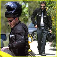 Joaquin Phoenix and his helmet head