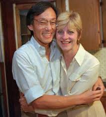 Steven Chu is hugged by his wife in 