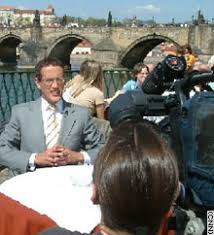 Richard Quest hard at work shooting
