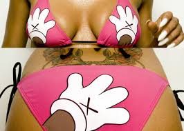 In hot pink, with the hands of KAWS� 